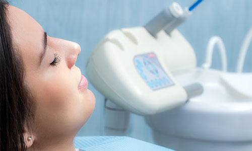 women_in_chair IV Sedation detnist and oral sedation