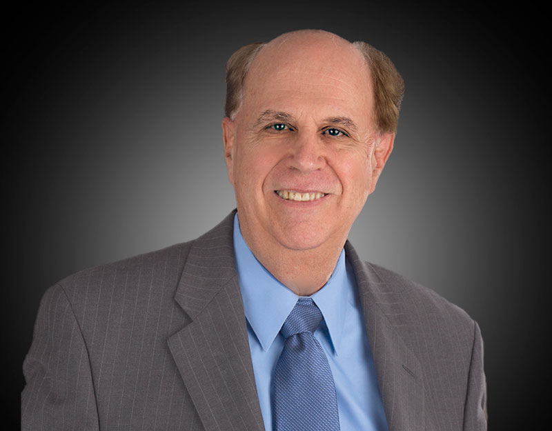 Gagne_light_coat_whitebk Richard Gagne, DDS treat patients with gag responses